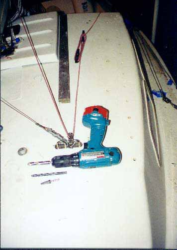 Drilling holes in sailboat deck for mounting genoa tracks